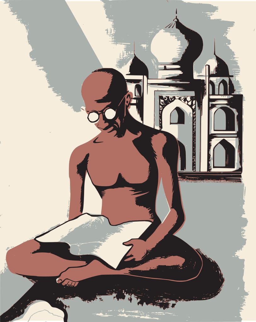 image de gandhi assi en tailleur en train de lire. il est installé devant le taj mahal. Un manière d'illustrer la citation qui parle de coaching 